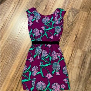 Lilly Pulitzer vibrant purple and green dress.
